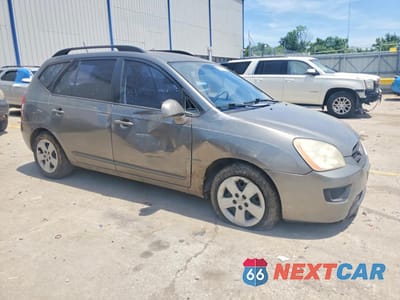Czwarte zdjęcie samochodu z boku: 2009 KIA RONDO BASE VIN:KNAFG528197269163 - miniatura
