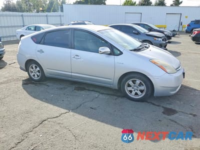 Czwarte zdjęcie samochodu z boku: 2007 TOYOTA PRIUS BASE VIN:JTDKB20U477646757 - miniatura