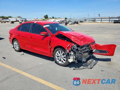 Czwarte zdjęcie samochodu z boku: 2012 VOLKSWAGEN JETTA SE VIN:3VWDP7AJ0CM342947 - miniatura