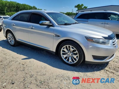 Czwarte zdjęcie samochodu z boku: 2014 FORD TAURUS LIMITED VIN:1FAHP2F85EG165201 - miniatura