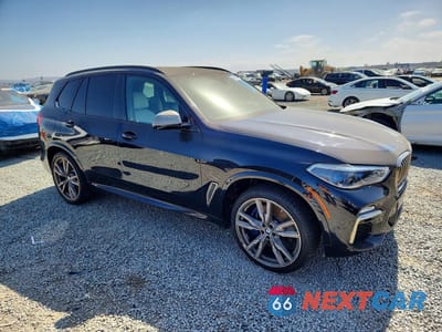 Czwarte zdjęcie samochodu z boku: 2020 BMW X5 M50I VIN:5UXJU4C01LL227792 - miniatura