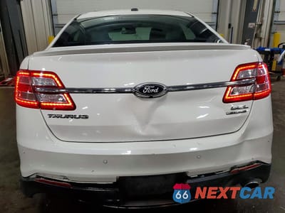 Zdjęcie 6 z 13 samochodu: 2016 FORD TAURUS SEL VIN:1FAHP2E81GG122009 - miniatura