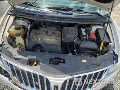Zdjęcie 12 z 13 samochodu: 2014 LINCOLN MKX VIN:2LMDJ6JK2EBL07824 - miniatura