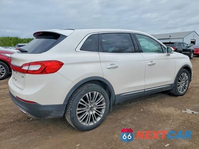 Trzecie zdjęcie samochodu z tyłu: 2017 LINCOLN MKX RESERVE VIN:2LMPJ8LR9HBL30699 - miniatura