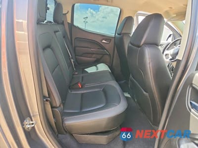 Zdjęcie 10 z 13 samochodu: 2021 GMC CANYON AT4 VIN:1GTG6FENXM1116164 - miniatura