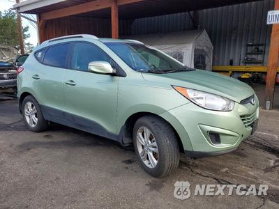 Czwarte zdjęcie samochodu z boku: 2012 HYUNDAI TUCSON GLS VIN:KM8JU3AC1CU402198 - miniatura