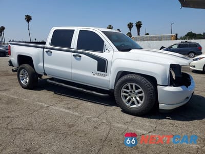 Czwarte zdjęcie samochodu z boku: 2018 CHEVROLET SILVERADO C1500 CUSTOM VIN:3GCPCPEC5JG419119 - miniatura