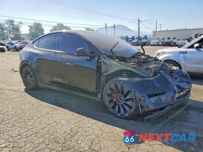 Czwarte zdjęcie samochodu z boku: 2022 TESLA MODEL Y VIN:7SAYGDEF7NF407781 - miniatura
