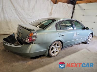 Trzecie zdjęcie samochodu z tyłu: 2002 NISSAN ALTIMA SE VIN:1N4BL11E62C198493 - miniatura