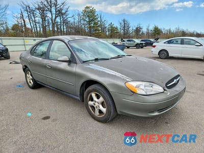 Czwarte zdjęcie samochodu z boku: 2001 FORD TAURUS SES VIN:1FAFP55U21A180257 - miniatura