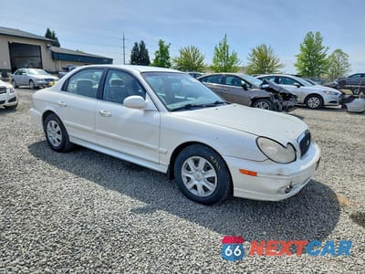 Czwarte zdjęcie samochodu z boku: 2002 HYUNDAI SONATA GL VIN:KMHWF25S32A521639 - miniatura