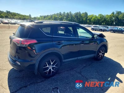 Trzecie zdjęcie samochodu z tyłu: 2017 TOYOTA RAV4 SE VIN:2T3JFREV1HW593502 - miniatura
