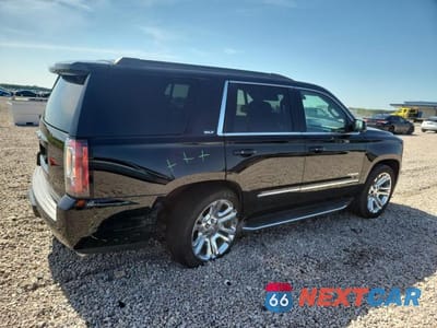 Trzecie zdjęcie samochodu z tyłu: 2018 GMC YUKON SLT VIN:1GKS2BKC3JR321585 - miniatura