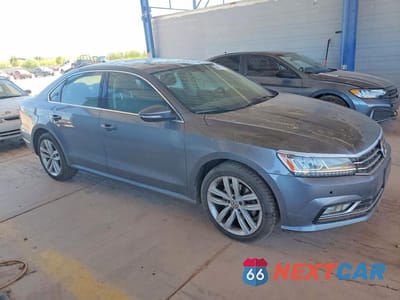 Czwarte zdjęcie samochodu z boku: 2018 VOLKSWAGEN PASSAT SE VIN:1VWBA7A32JC023445 - miniatura