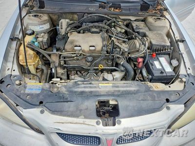 Zdjęcie 11 z 12 samochodu: 2002 PONTIAC GRAND AM SE1 VIN:1G2NF52E32C270002 - miniatura