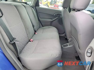 Zdjęcie 10 z 12 samochodu: 2004 FORD FOCUS ZX5 VIN:3FAFP37304R112400 - miniatura