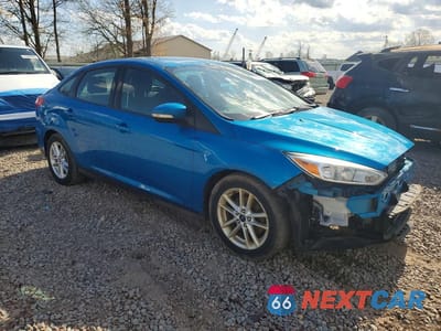Czwarte zdjęcie samochodu z boku: 2017 FORD FOCUS SE VIN:1FADP3F26HL250818 - miniatura