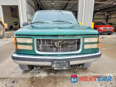 Piąte zdjęcie samochodu w środku: 1999 GMC SIERRA K1500 VIN:1GTEK19R9XR502387 - miniatura