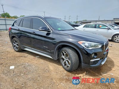 Czwarte zdjęcie samochodu z boku: 2017 BMW X1 XDRIVE28I VIN:WBXHT3Z34H4A58258 - miniatura