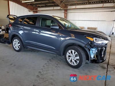 Czwarte zdjęcie samochodu z boku: 2021 HYUNDAI TUCSON VALUE VIN:KM8J33A40MU402836 - miniatura