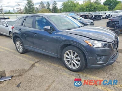 Czwarte zdjęcie samochodu z boku: 2015 MAZDA CX-5 GT VIN:JM3KE4DY7F0496710 - miniatura