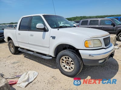 Czwarte zdjęcie samochodu z boku: 2001 FORD F150 SUPERCREW VIN:1FTRW08W91KD95882 - miniatura