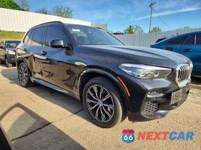 Czwarte zdjęcie samochodu z boku: 2022 BMW X5 XDRIVE40I VIN:5UXCR6C02N9K11221 - miniatura