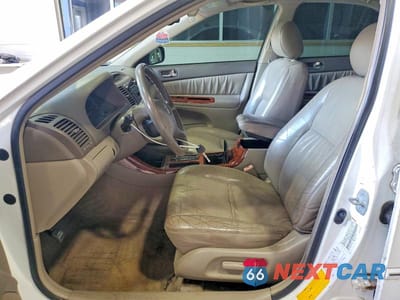 Zdjęcie 7 z 12 samochodu: 2003 TOYOTA CAMRY XLE V6 VIN:JTDBF30K430112363 - miniatura