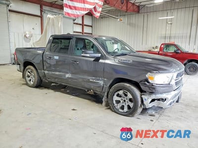 Czwarte zdjęcie samochodu z boku: 2021 RAM 1500 BIG HORN VIN:1C6SRFFT1MN774468 - miniatura