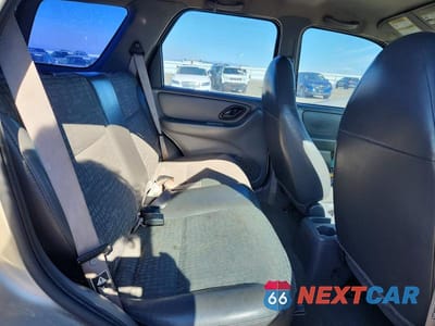 Zdjęcie 10 z 12 samochodu: 2001 FORD ESCAPE XLS VIN:1FMYU02171KA68598 - miniatura