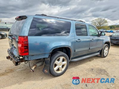 Trzecie zdjęcie samochodu z tyłu: 2009 CHEVROLET SUBURBAN K1500 LT VIN:1GNFK26359R246348 - miniatura