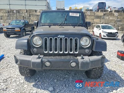 Piąte zdjęcie samochodu w środku: 2016 JEEP WRANGLER UNLIMITED SAHARA VIN:1C4BJWEG3GL248489 - miniatura