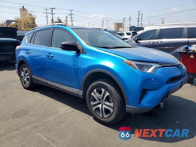 Czwarte zdjęcie samochodu z boku: 2018 TOYOTA RAV4 LE VIN:JTMZFREV4JJ753265 - miniatura