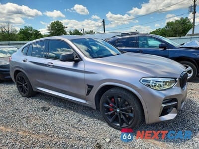Czwarte zdjęcie samochodu z boku: 2021 BMW X4 VIN:5UX2V5C04M9F00670 - miniatura