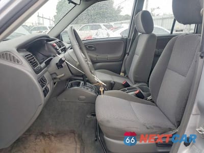 Zdjęcie 7 z 13 samochodu: 1999 CHEVROLET TRACKER VIN:2CNBJ13C8X6917086 - miniatura