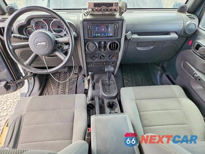Zdjęcie 8 z 14 samochodu: 2007 JEEP WRANGLER SAHARA VIN:1J4GA59167L123079 - miniatura