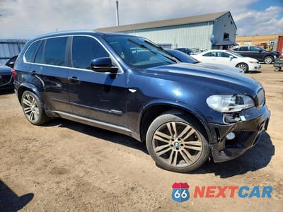 Czwarte zdjęcie samochodu z boku: 2012 BMW X5 XDRIVE50I VIN:5UXZV8C52CL424862 - miniatura