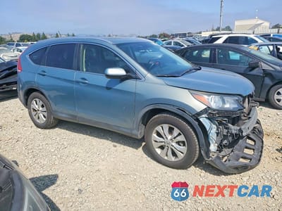 Czwarte zdjęcie samochodu z boku: 2012 HONDA CR-V EXL VIN:JHLRM4H70CC020095 - miniatura