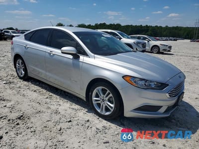Czwarte zdjęcie samochodu z boku: 2018 FORD FUSION SE HYBRID VIN:3FA6P0LU5JR248160 - miniatura