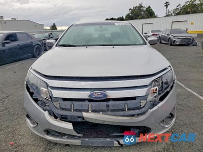 Piąte zdjęcie samochodu w środku: 2010 FORD FUSION HYBRID VIN:3FADP0L32AR418893 - miniatura