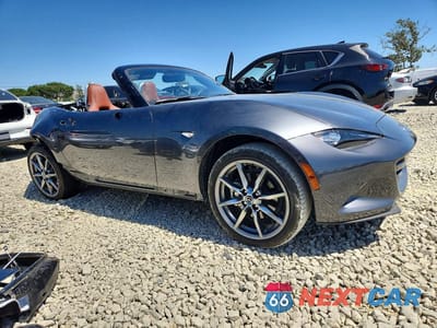 Czwarte zdjęcie samochodu z boku: 2023 MAZDA MX-5 MIATA GRAND TOURING VIN:JM1NDAD71P0553127 - miniatura