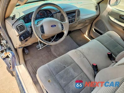Zdjęcie 8 z 12 samochodu: 2002 FORD F150 VIN:1FTRX172X2NC03645 - miniatura