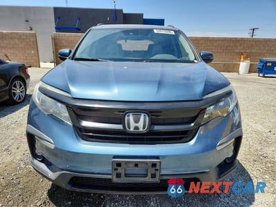 Piąte zdjęcie samochodu w środku: 2022 HONDA PILOT SE VIN:5FNYF5H21NB003681 - miniatura