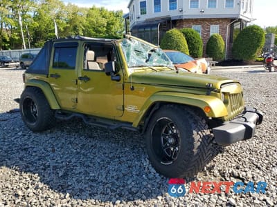 Czwarte zdjęcie samochodu z boku: 2007 JEEP WRANGLER SAHARA VIN:1J8GA59147L161148 - miniatura