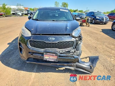 Piąte zdjęcie samochodu w środku: 2018 KIA SPORTAGE LX VIN:KNDPM3AC1J7374106 - miniatura