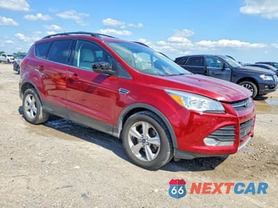 Czwarte zdjęcie samochodu z boku: 2014 FORD ESCAPE SE VIN:1FMCU0G94EUC44543 - miniatura