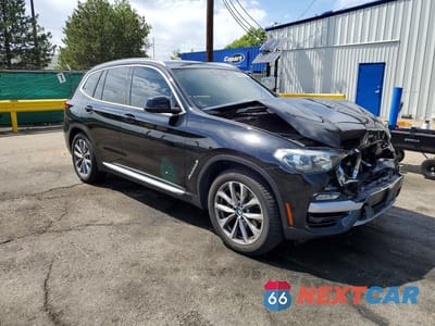 Czwarte zdjęcie samochodu z boku: 2019 BMW X3 XDRIVE30I VIN:5UXTR9C59KLP90929 - miniatura