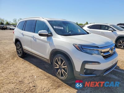 Czwarte zdjęcie samochodu z boku: 2021 HONDA PILOT TOURING VIN:5FNYF6H92MB002038 - miniatura