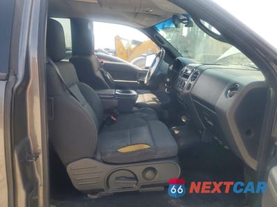 Zdjęcie 7 z 12 samochodu: 2005 FORD F150 VIN:1FTPX14585KB73086 - miniatura