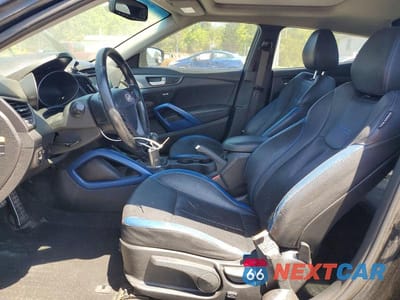 Zdjęcie 7 z 12 samochodu: 2013 HYUNDAI VELOSTER VIN:KMHTC6AE7DU157357 - miniatura